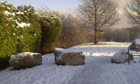 Photograph of rocks bloacking access from Deeside Drive to the Deeside Way